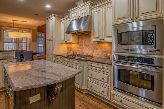 A stylish kitchen featuring stainless steel appliances and luxurious counter space.